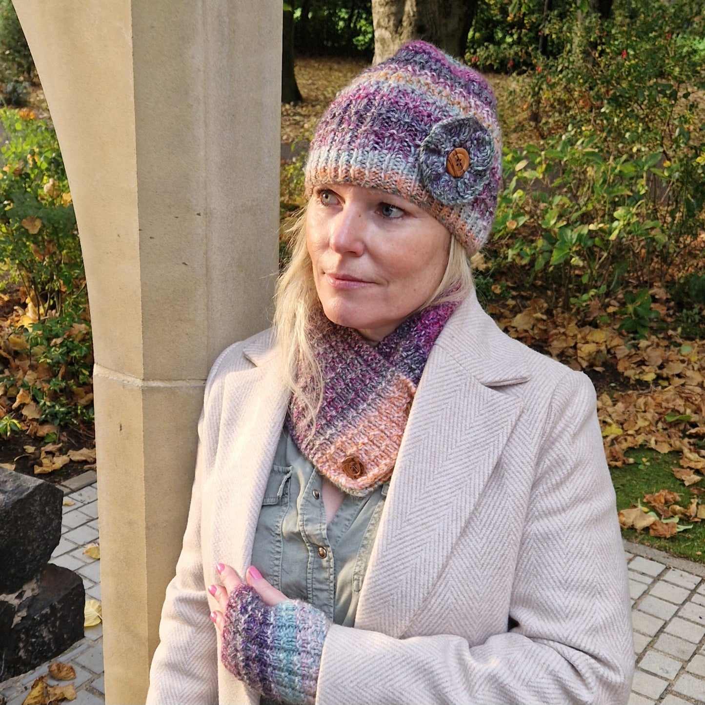 Handknit hat with detachable flower brooch - orange, purple and pale green