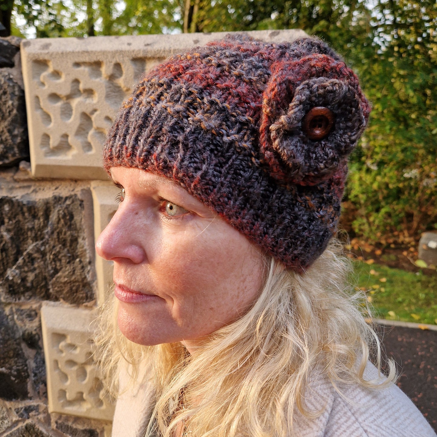 Handknit beanie hat with detachable flower brooch - brown mix