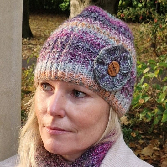 Handknit hat with detachable flower brooch - orange, purple and pale green