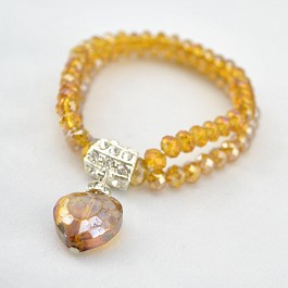 girls-and-pearls-amber-crystal-beaded-bracelet-with-amber-crystal-heart-and-diamante-detail.jpg